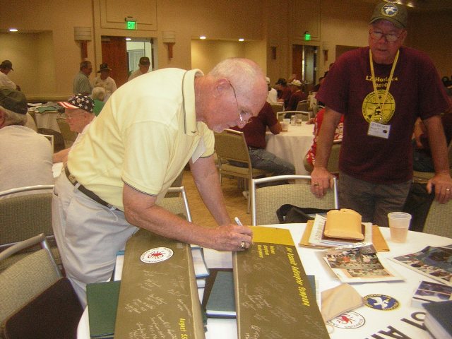 (4806) From the 1965 era, Wayne Cone signs his name to the 161st Tail Rotor Blades.