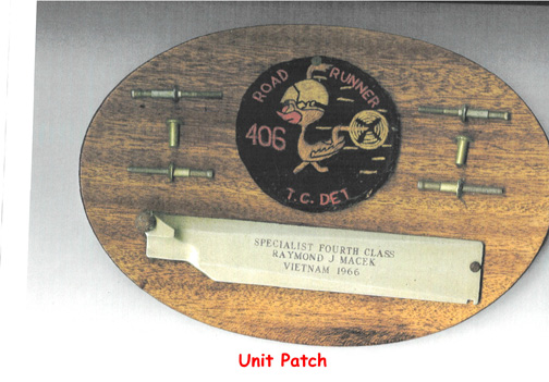 Plaque from the 406th TC, with rivets, 406 patch, fin from a 2.75 rocket