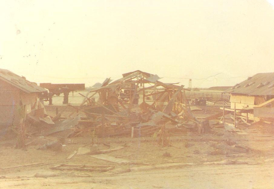 (026) The Tech Supply office after taking a direct rocket hit during the night of TET.  Fortunately, no one was hurt by this hit.